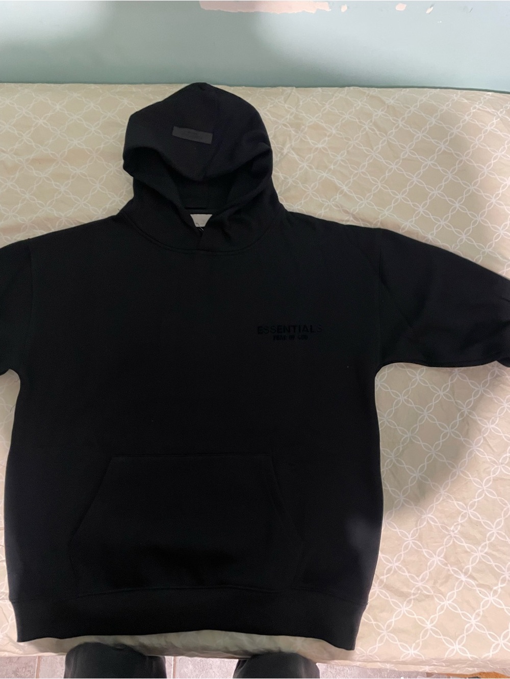 Essentials Black Pullover Hoodie with Subtle Chest Logo